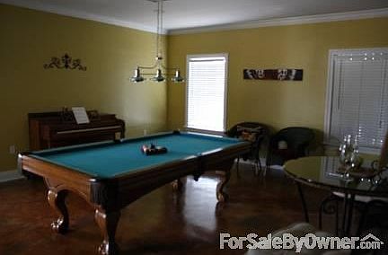 Large game with half bath. Could be used as 4th bedroom.