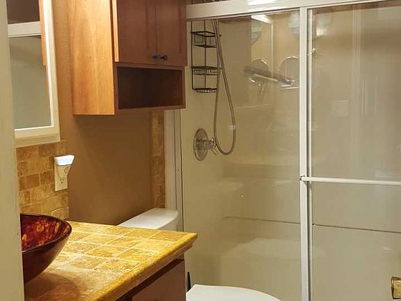 Waterfall sink, full shower