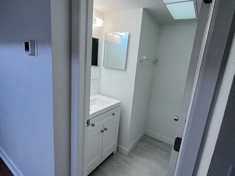 Half-bath off kitchen.