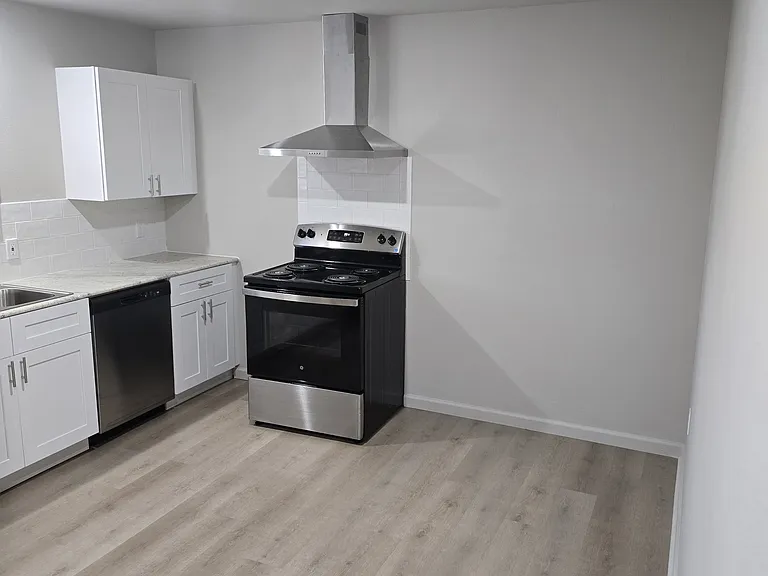 New cabinets, new granite and backsplash and space for a table