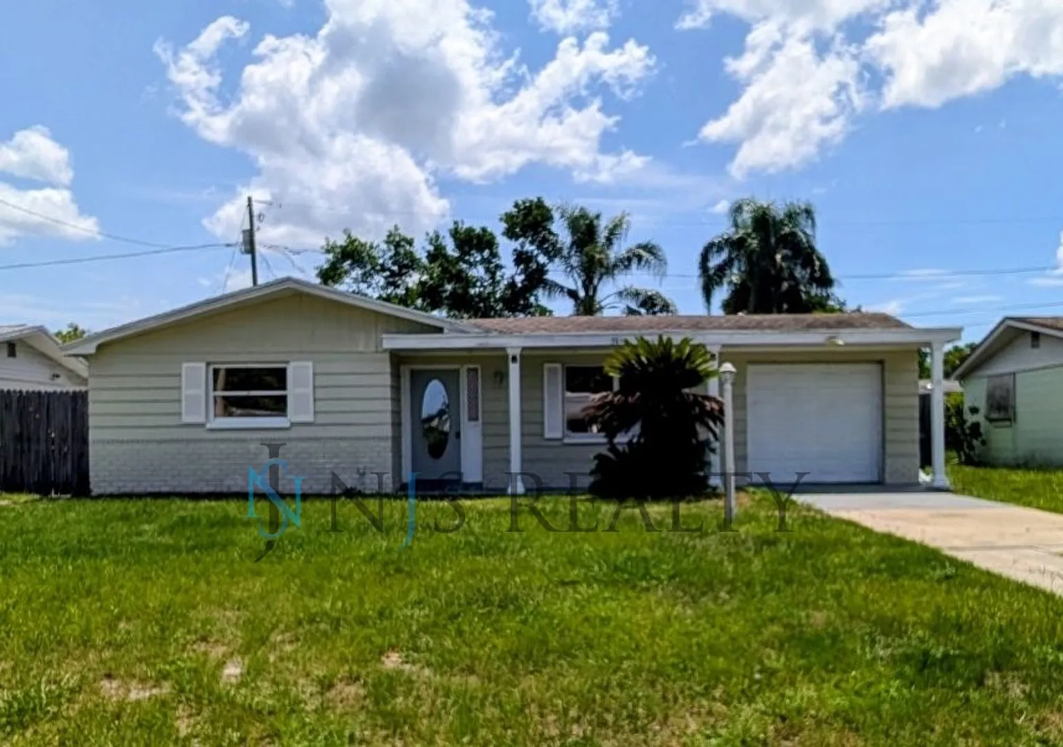 Newly Renovated 3/1/1 New Flooring, New Paint, Updated Kitchen & Bath, Fenced Yard.. A Must See!! — Photo 1