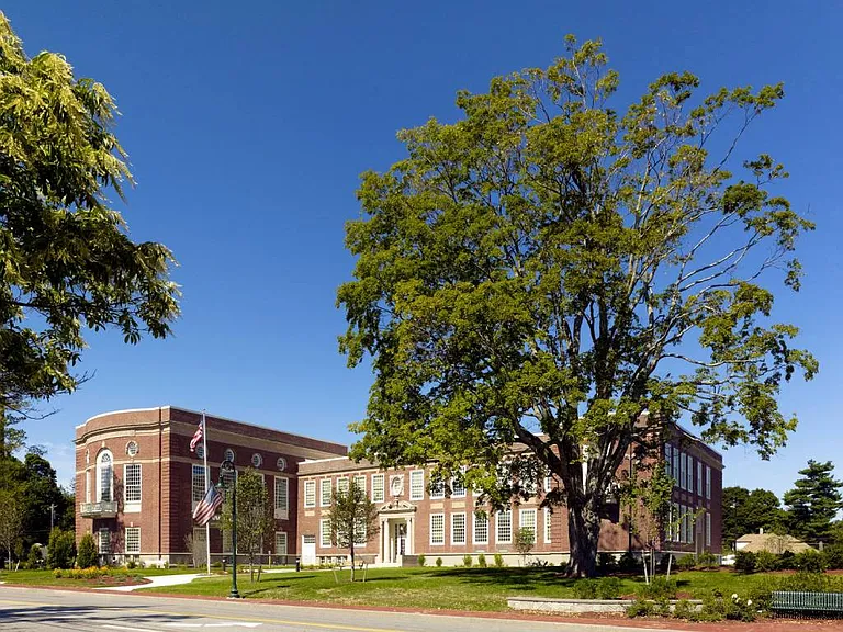 Grass and trees surrounding Wilber School Apartments