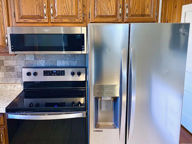 New range, microwave and fridge