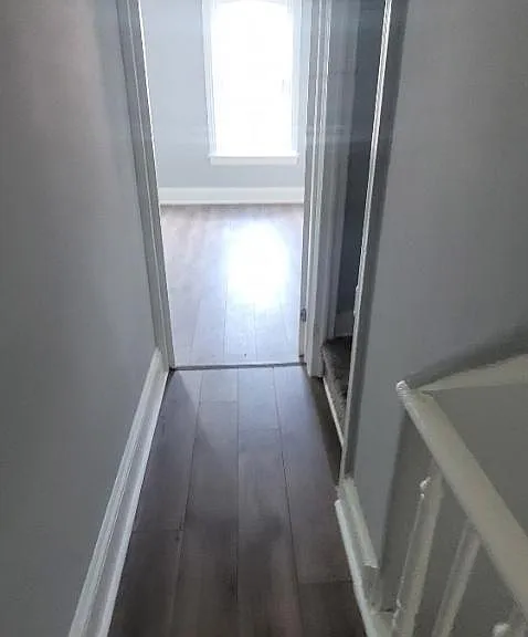 Hallway view to Master bedroom with view of stairwell leading to 3rd floor w/ Bedroom #4 which is in the spacious, finished attic