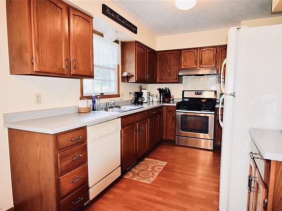 A new stove and wood laminate flooring were installed recently. Not pictured is a new Moen faucet.