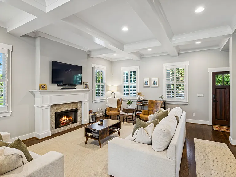 Spacious living room with lots of natural light and comfortable seating for your group. Smart TV with all the streaming apps and a fireplace for cozy nights in.