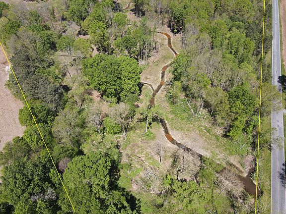 Newly restored Waxhaw Branch which is part of a 57 acre perpetual conservation easement. 37 acres are of the property are not encumbered by the easement