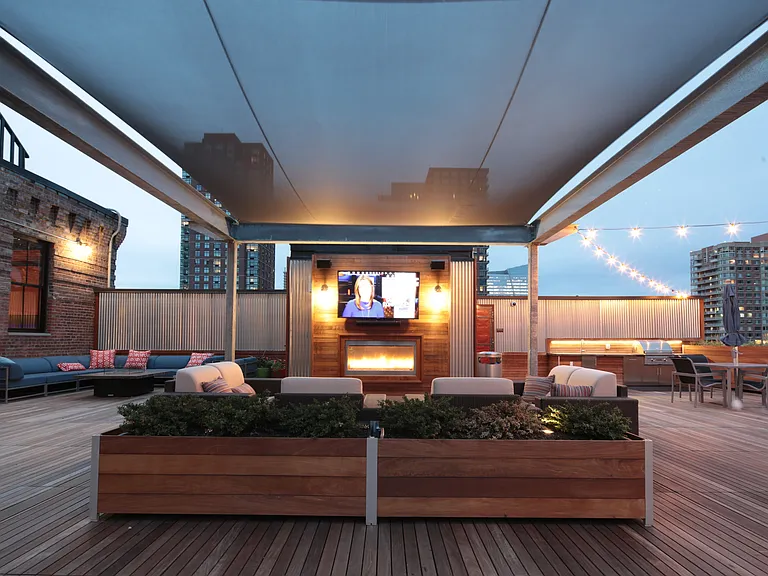 Enjoy Lounging While Watching the Big-Screen TV