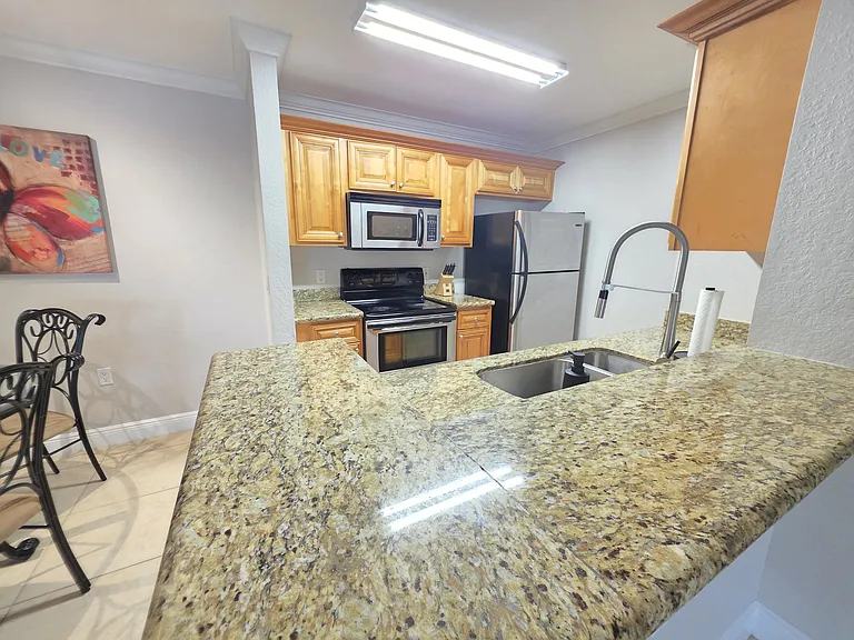 8926 Manor Loop #102 — Photo 36