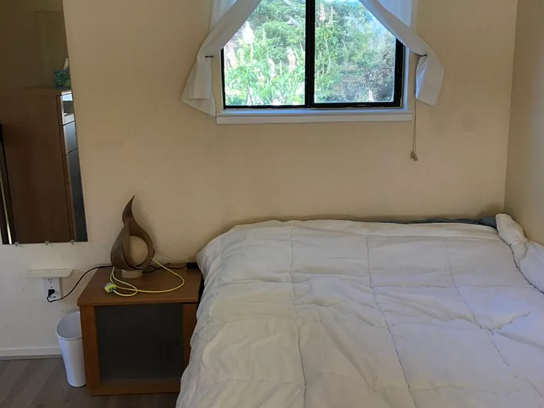 Full size bed in bedroom