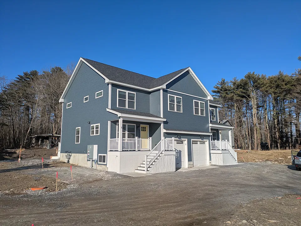 Outside, unit 1 is left side (landscaping is finished)
