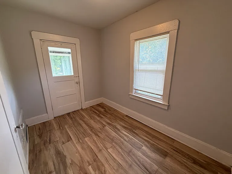 bedroom w/ second floor enclosed patio