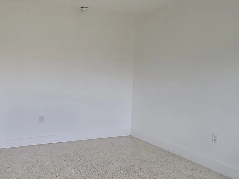 Spacious living room adjacent and open to kitchen