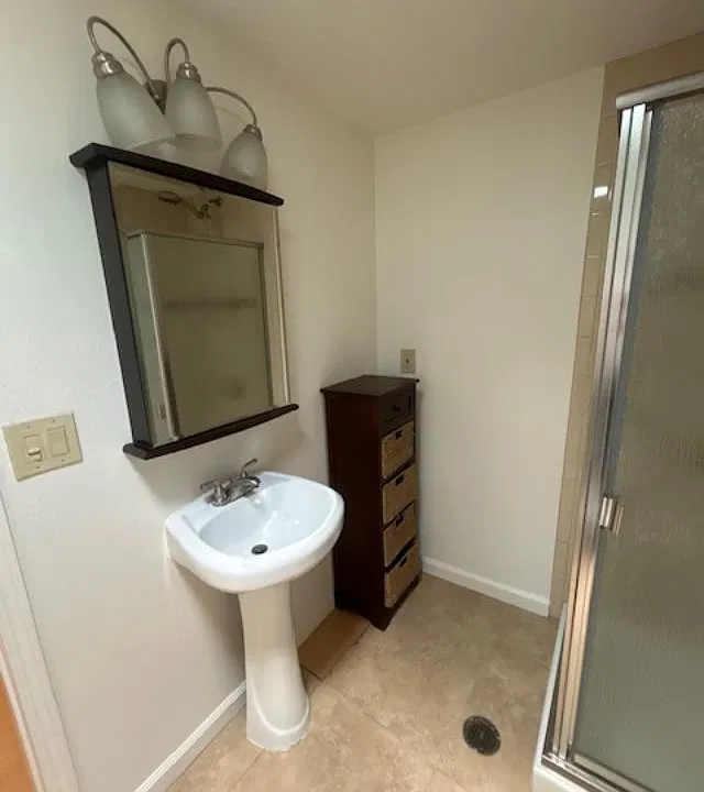 Bathroom sink, mirror.