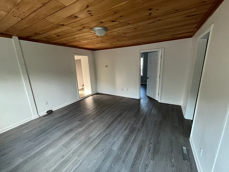 Living room connects to front room, bed room 2 and kitchen