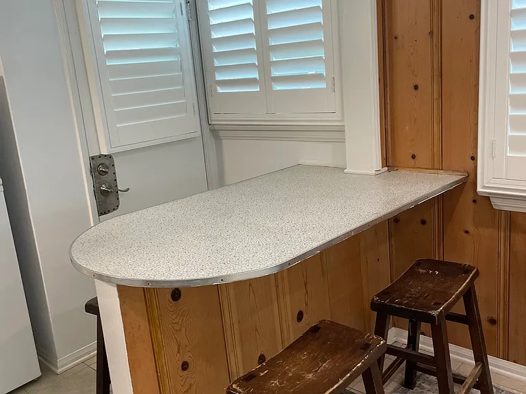 Kitchen Nook and rear door shown