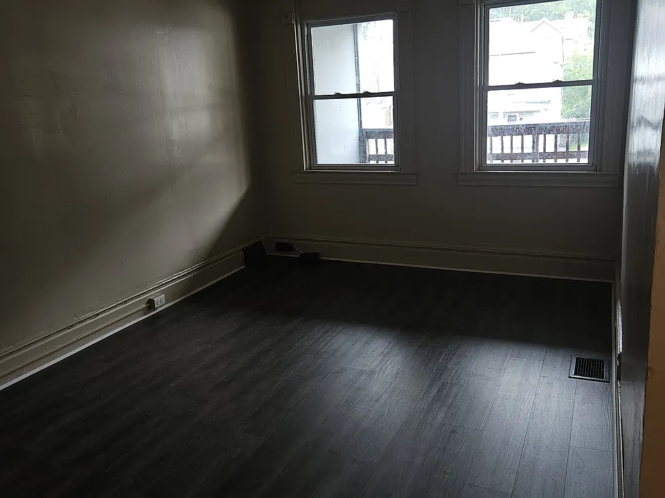 Living Room. Sorry its a dark picture. Was a very rainy day