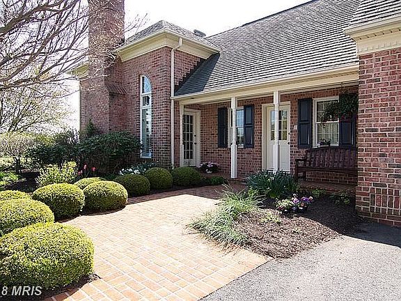 Side Entrance - Covered Brick Porch