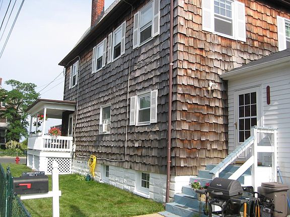 REAR OF HOUSE. UNIOT ENTRY