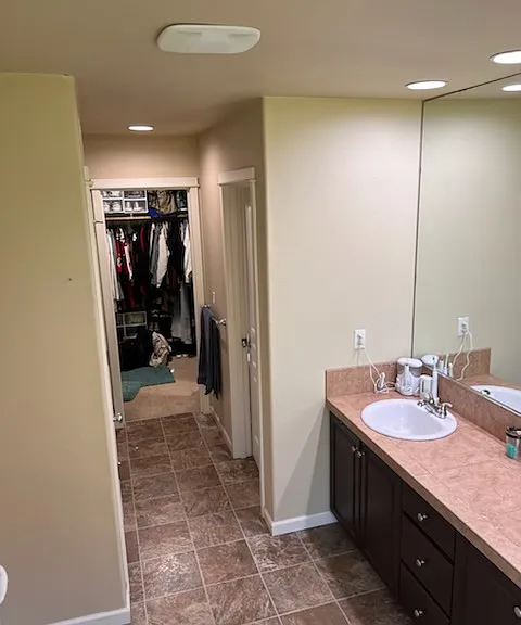 Master bath with walk-in closet. Note that rental is unfurnished.