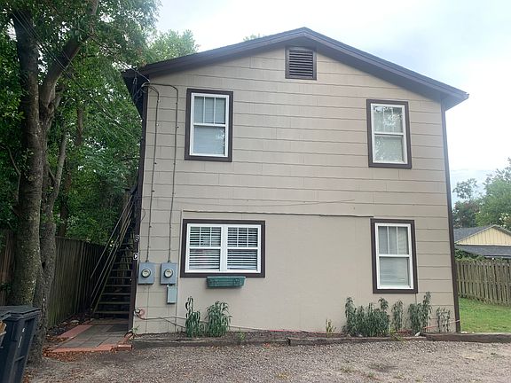 Shares wall with only upper unit.