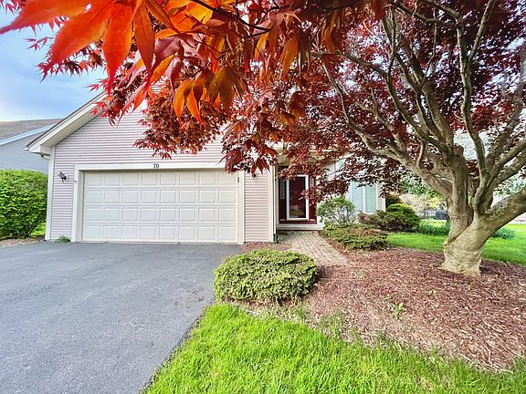Attached two-car garage with front entrance.