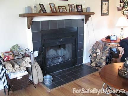 Living Room
						:
						Laminate flooring in the living room, dining room, kitchen and hallway