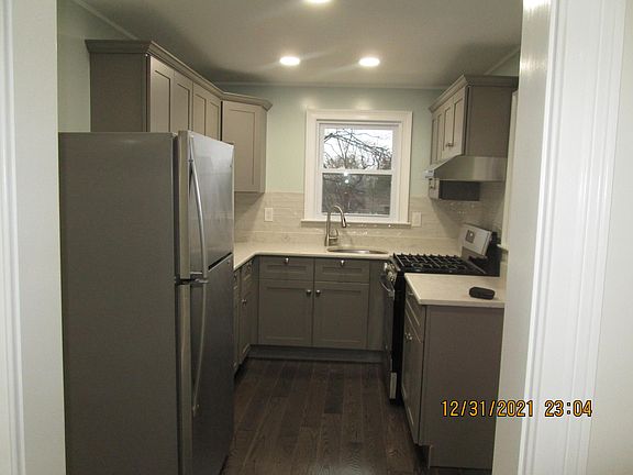 New Quartz countertop ,backsplash and Kohler Faucet