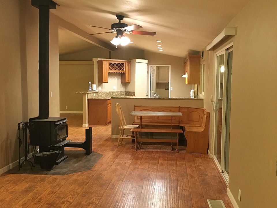 Living room kitchen and the door leads to the laundry room