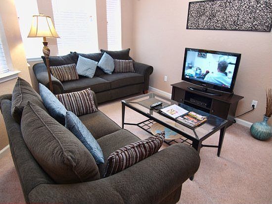 TR2C122-Living-Area-with-TV-Set