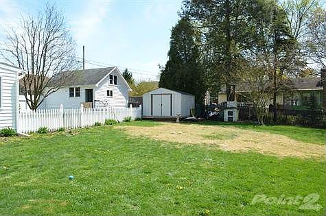 Shed, garage and fenced yard