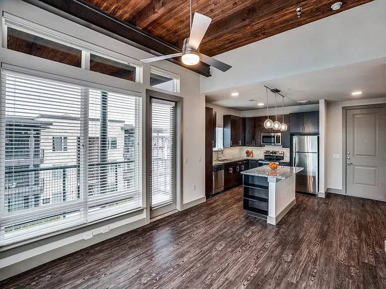 Espresso finish package kitchen and dining area with hard surface flooring throughout