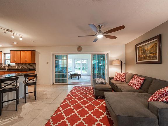 Spacious living room that visible from the kitchen and has easy access to the den addition.