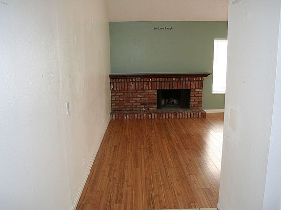 fireplace, laminate flooring