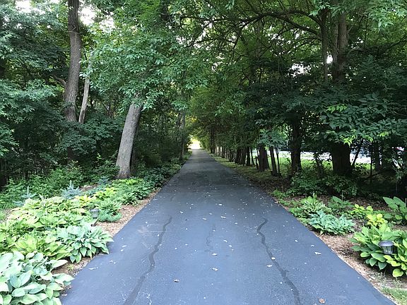 Private wooded driveway.