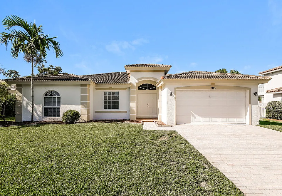 103 Cocoplum Cir