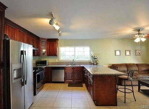 updated Kitchen with Stainless Steel Appliances and Granite coun