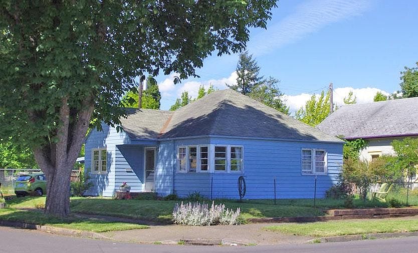 Large corner lot. Cute bungalow with tons of storage!