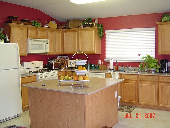 Kitchen with Silestone countertops and tile floors