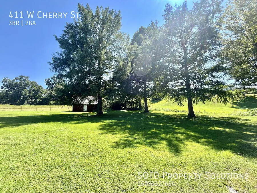 Spacious 3-Bedroom Home with Large Deck, Yard & 2-Car Garage! — Photo 4