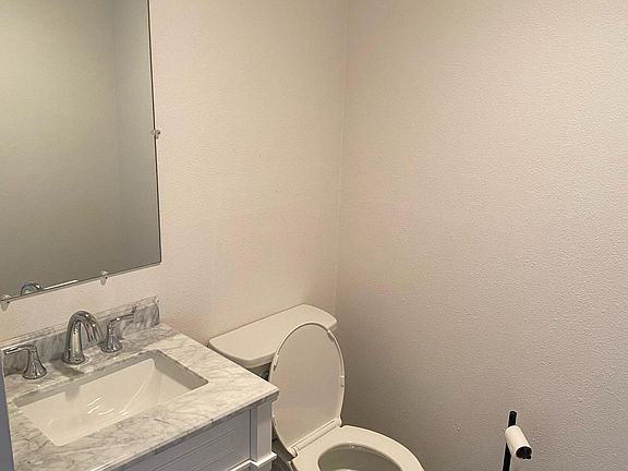 Half Bath between living room and kitchen on main floor