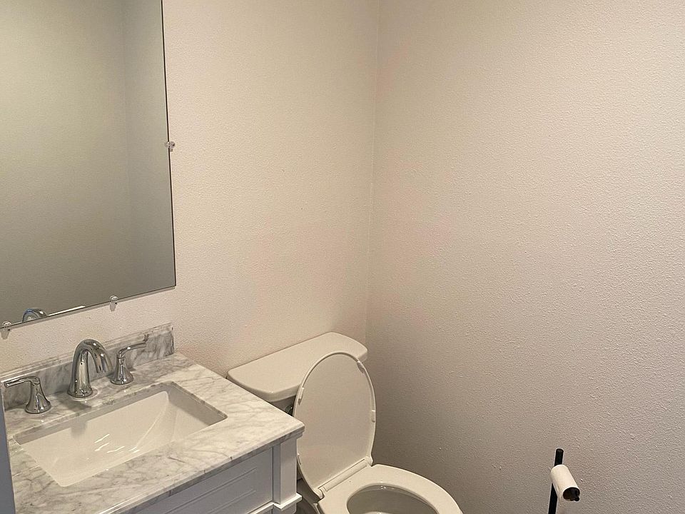 Half Bath between living room and kitchen on main floor
