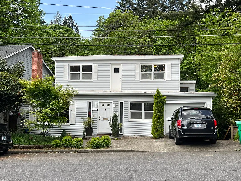 New roof (not pictured), street parking, lots of light and storage. Perfect for walking to OHSU and best schools in Portland. Entrance is down the stairs on north side of home.
