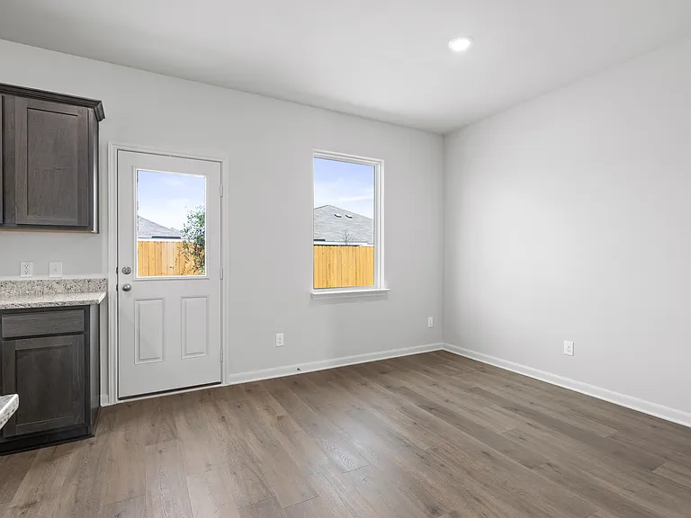 The dining room sits right off of the kitchen.