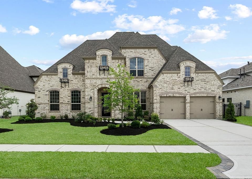 Welcome home to 25014 Karacabey Court in the gated community of The Lakes of Shadow Creek at Augusta Pines.