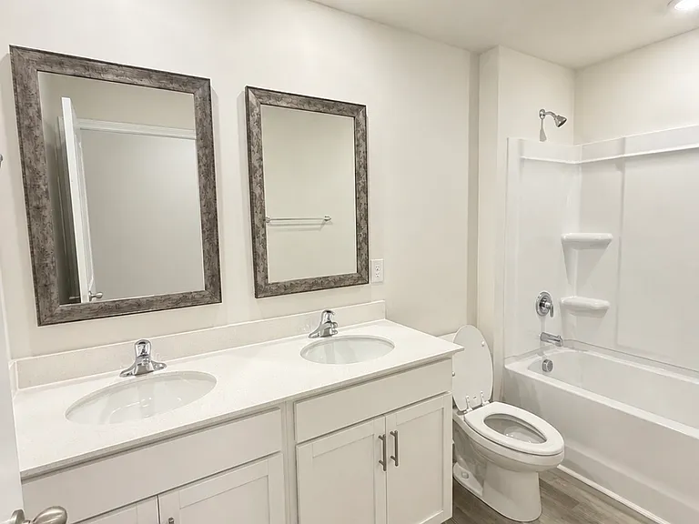Guest bathroom features a double sink.