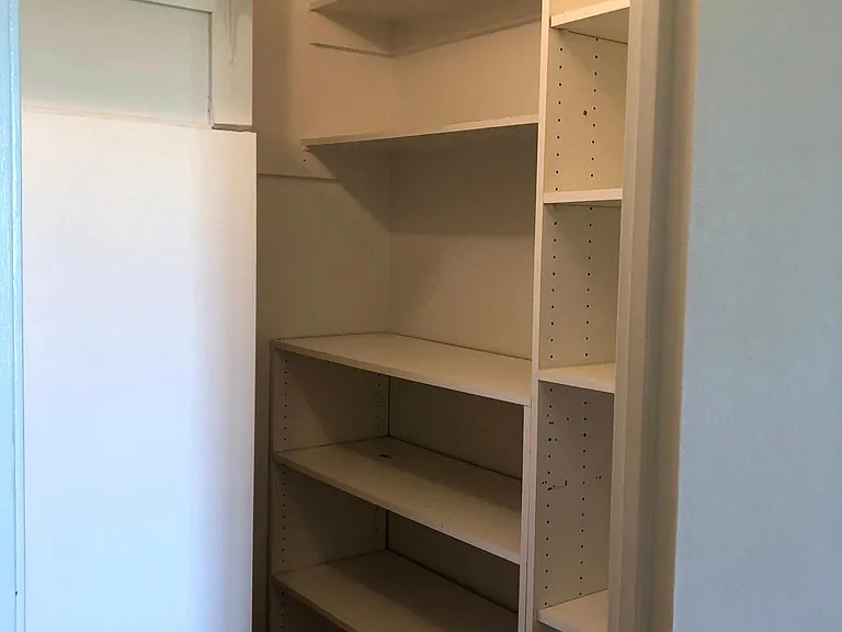 Master bedroom walk-in closet (2/3)