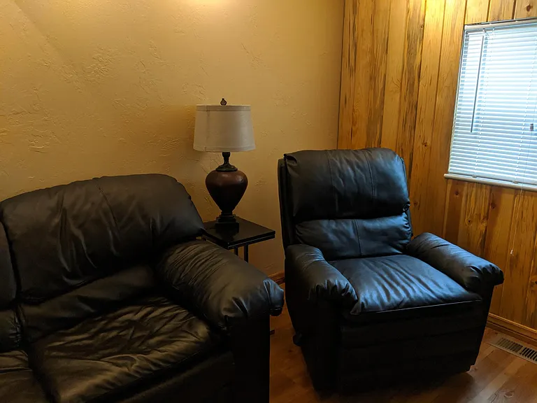 Leather love seat and recliner