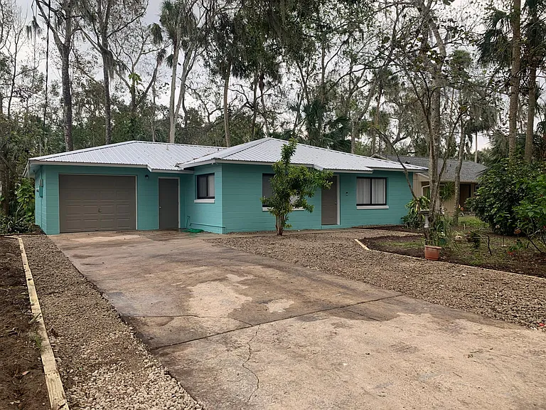 Front with extended driveway