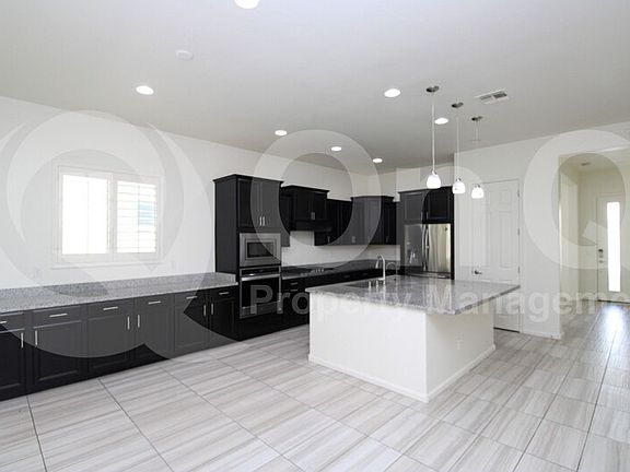 5th image of 235 E Honeysuckle Pl